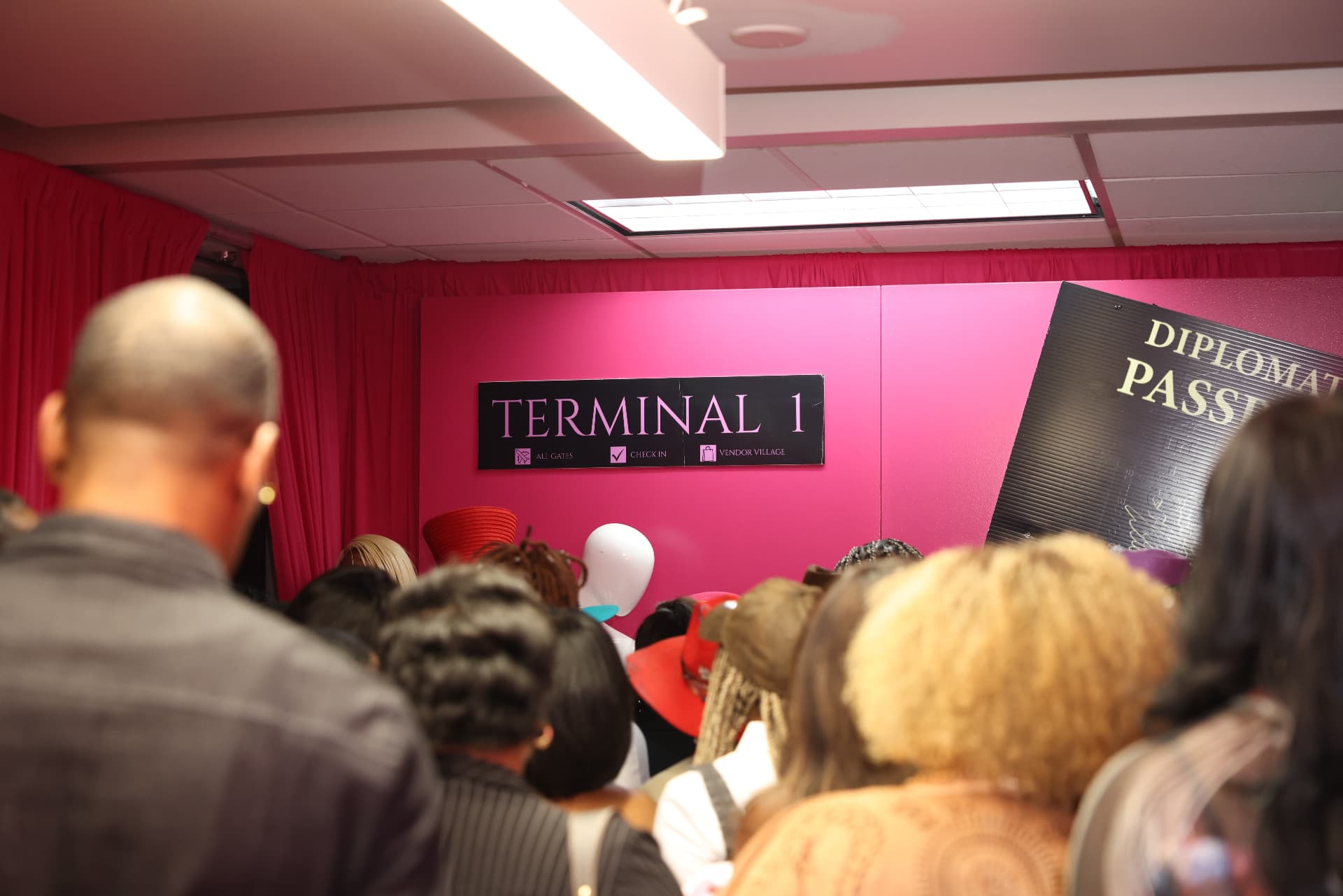 Terminal 1 signage at the pink event entrance